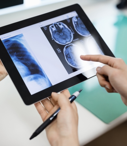 Doctor and patient using digital tablet